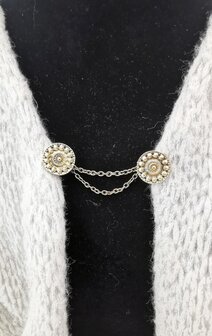 Clips met dubbel ketting Zeeuwse knoop goudkleurig.