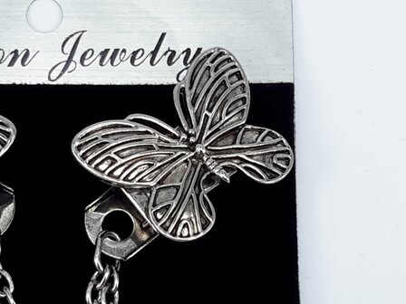 Clips met dubbel ketting vlinder in kleur antiek zilver look.