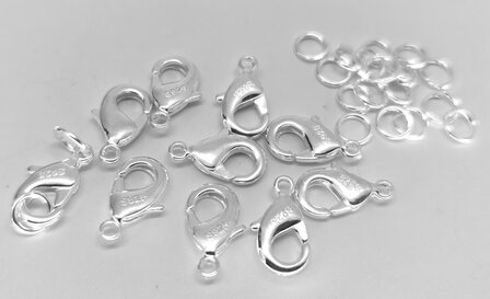 100 x 925 verzilverd karabijnsluiting L 12 mm gratis 20 verzilverd open ringetjes. 