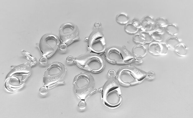 100 x 925 verzilverd karabijnsluiting L 12 mm gratis 20 verzilverd open ringetjes. 