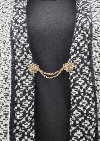 Clips met dubbel ketting, Edelweiss in goudkleur.
