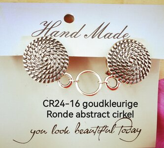 Clips, met symbool cirkel en midden een ring in kleur antiek goud look. 