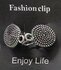 Clips, met symbool cirkel en midden een ring in kleur antiek zilver look. _